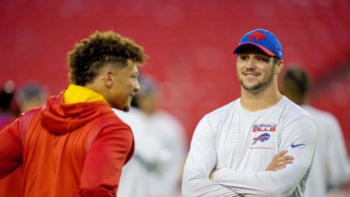 Bills quarterback Josh Allen (17) talks with Kansas City Chiefs quarterback Patrick Mahomes (15) before the game at GEHA Field at Arrowhead Stadium.